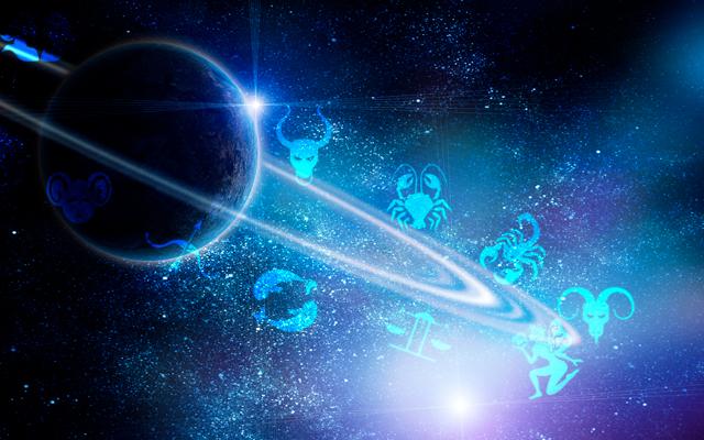 Planeta Saturno com símbolos dos signos ao lado