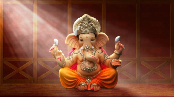 imagem de ganesha com um fecho de luz em um ambiente sagrado