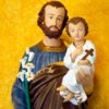 imagem de são josé carregando jesus no colo em fundo amarelo